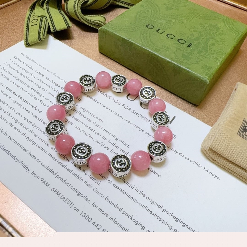 G*u*i bracelets